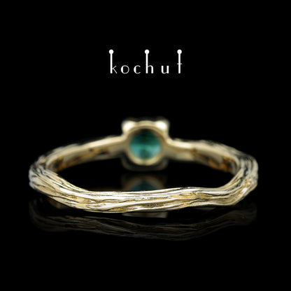 Winterzweig — Ring aus Gelbgold mit Smaragd