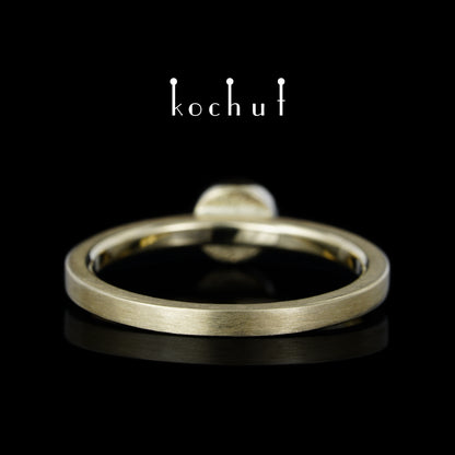 Erde — Ring aus Gelbgold mit Smaragd