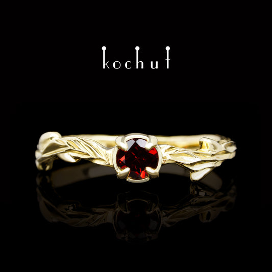 März-Zweig — Ring aus Gelbgold mit Granat