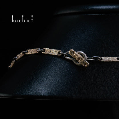 Leib und Seele — eine Kette aus oxidiertem Silber und Gelbgold