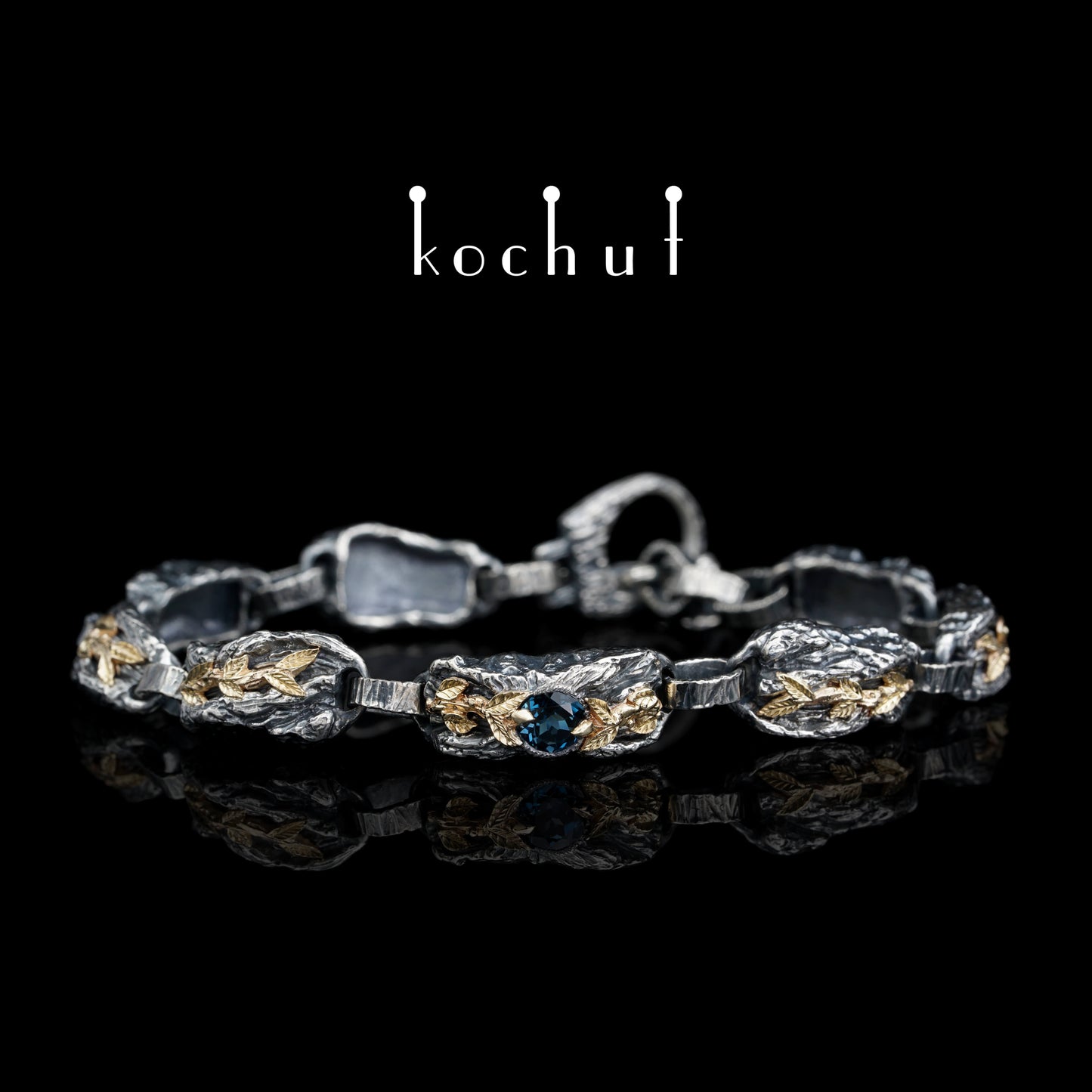 Kraft des Lebens — Armband aus oxidiertem Silber und Gelbgold mit Topas