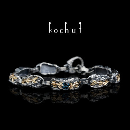 Kraft des Lebens — Armband aus oxidiertem Silber und Gelbgold mit Topas