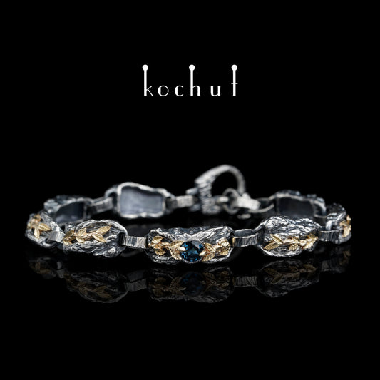 Kraft des Lebens — Armband aus oxidiertem Silber und Gelbgold mit Topas