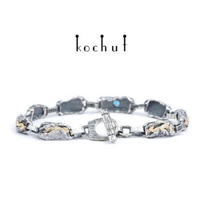 Kraft des Lebens — Armband aus oxidiertem Silber und Gelbgold mit Topas