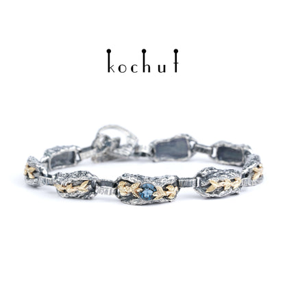 Kraft des Lebens — Armband aus oxidiertem Silber und Gelbgold mit Topas
