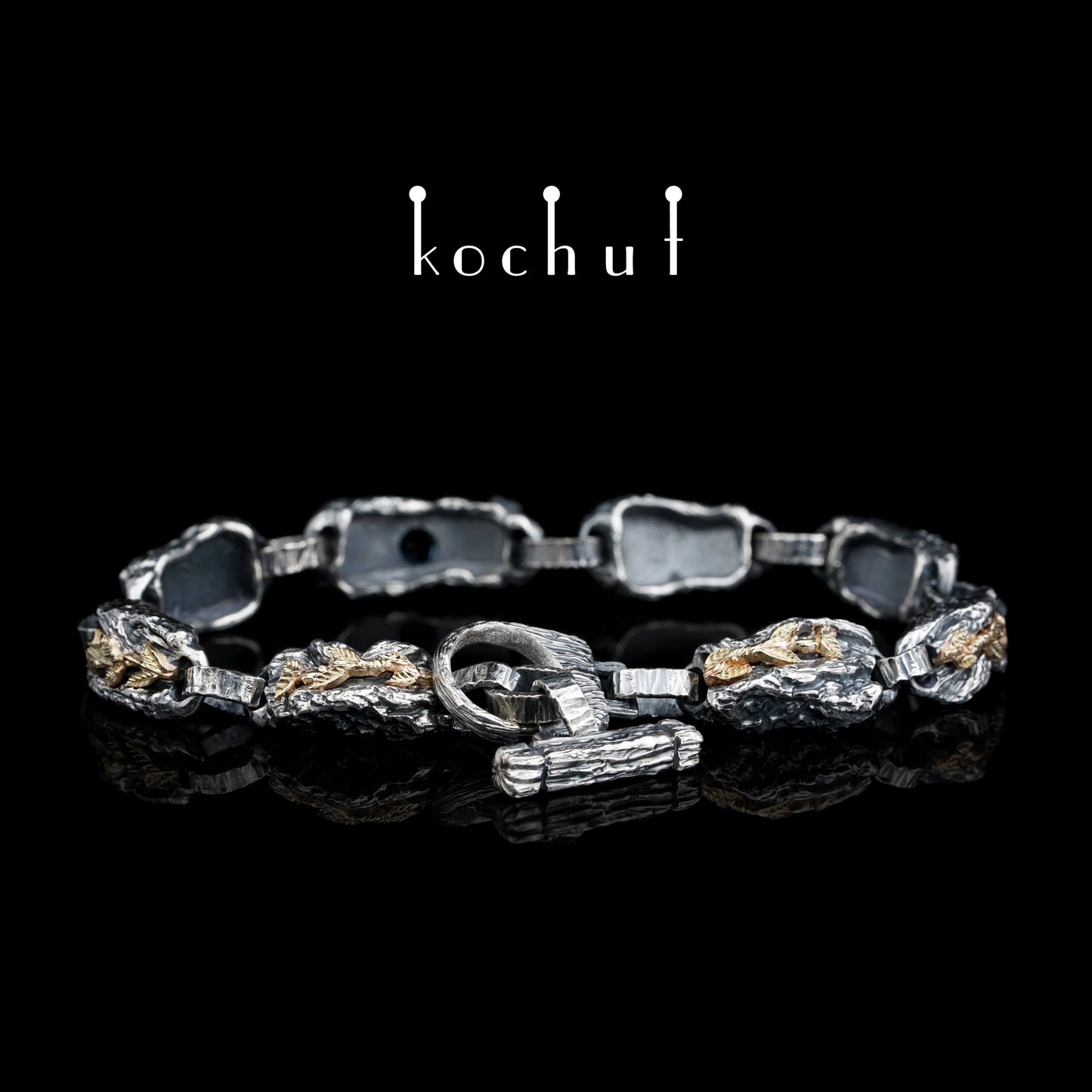 Kraft des Lebens — Armband aus oxidiertem Silber und Gelbgold mit Topas