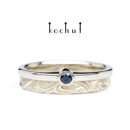 In Freude und Leid: Halbe — Ring aus Weißgold mit Saphir