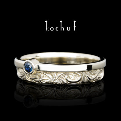 In Freude und Leid: Halbe — Ring aus Weißgold mit Saphir