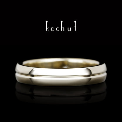 Achse der Liebe — Ehering aus Weißgold mit Diamant