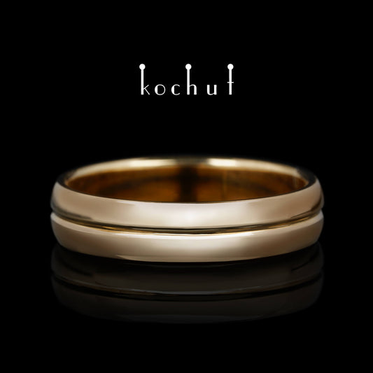 Achse der Liebe — verengter Ehering aus Rotgold