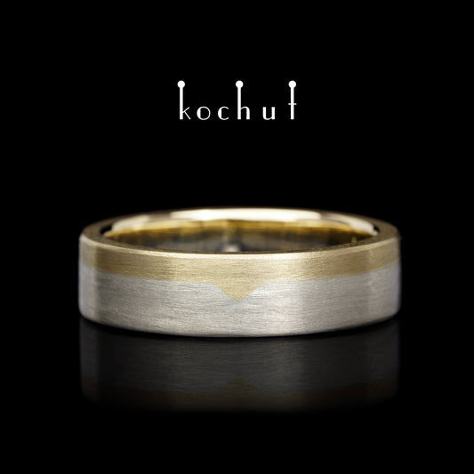 Die letzte Grenze – flach geformter Ehering aus Gelbgold und Sterlingsilber