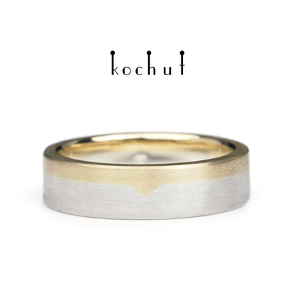 Die letzte Grenze – flach geformter Ehering aus Gelbgold und Sterlingsilber