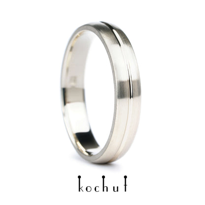 Die Achse der Liebe — Ehering aus Weißgold