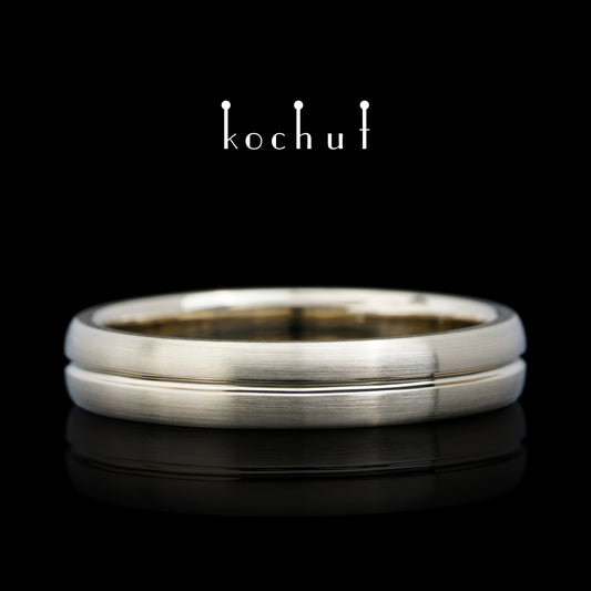 Die Achse der Liebe — Ehering aus Weißgold