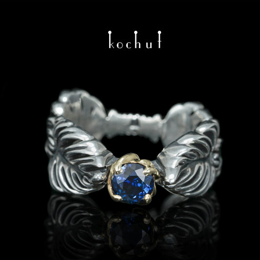 Umarmung der Liane — Ring aus oxidiertem Silber und Gelbgold mit Saphir