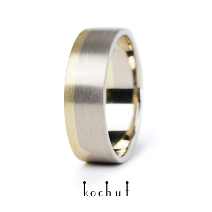 Die letzte Grenze – flach geformter Ehering aus Gelbgold und Palladiumgold