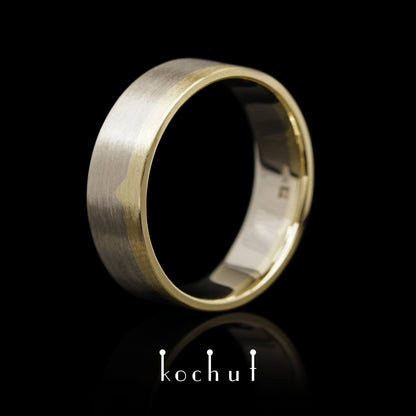 Die letzte Grenze – flach geformter Ehering aus Gelbgold und Palladiumgold