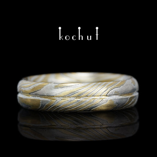 Die Achse der Liebe — nahtlose Mokume-Ehering aus Gelbgold und graviertem Silber