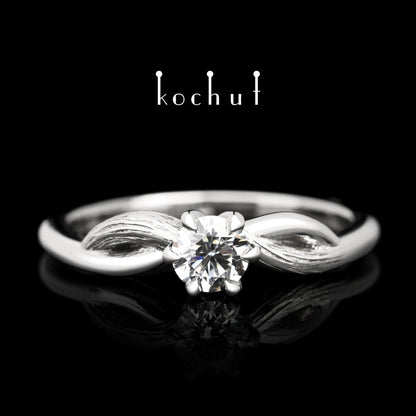 Deja vu – Platinring mit Diamant
