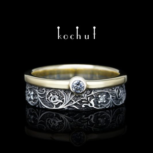 Harmonie der Natur — ein Ring aus Silber und Gelbgold mit Diamanten, überzogen mit schwarzem Rhodium