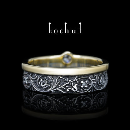 Harmonie der Natur — ein Ring aus Silber und Gelbgold mit Diamanten, überzogen mit schwarzem Rhodium