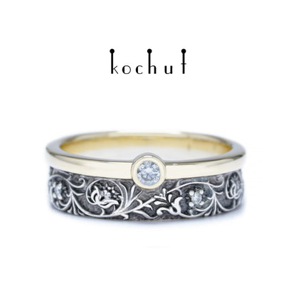 Harmonie der Natur — ein Ring aus Silber und Gelbgold mit Diamanten, überzogen mit schwarzem Rhodium