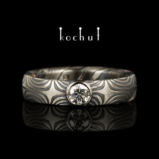 Orion — Mokume-Ring aus Palladium-Gold sowie geätztem und oxidiertem Silber mit Diamant