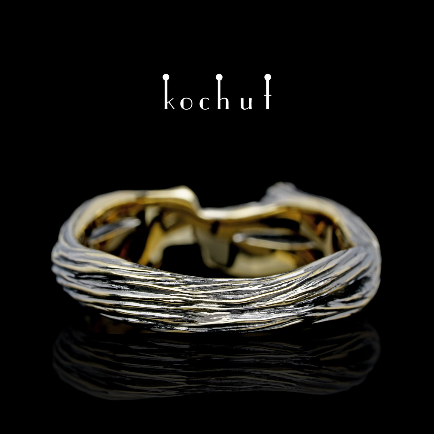 Zweig: Revival — Gelbgoldring mit Smaragden, überzogen mit schwarzem Rhodium