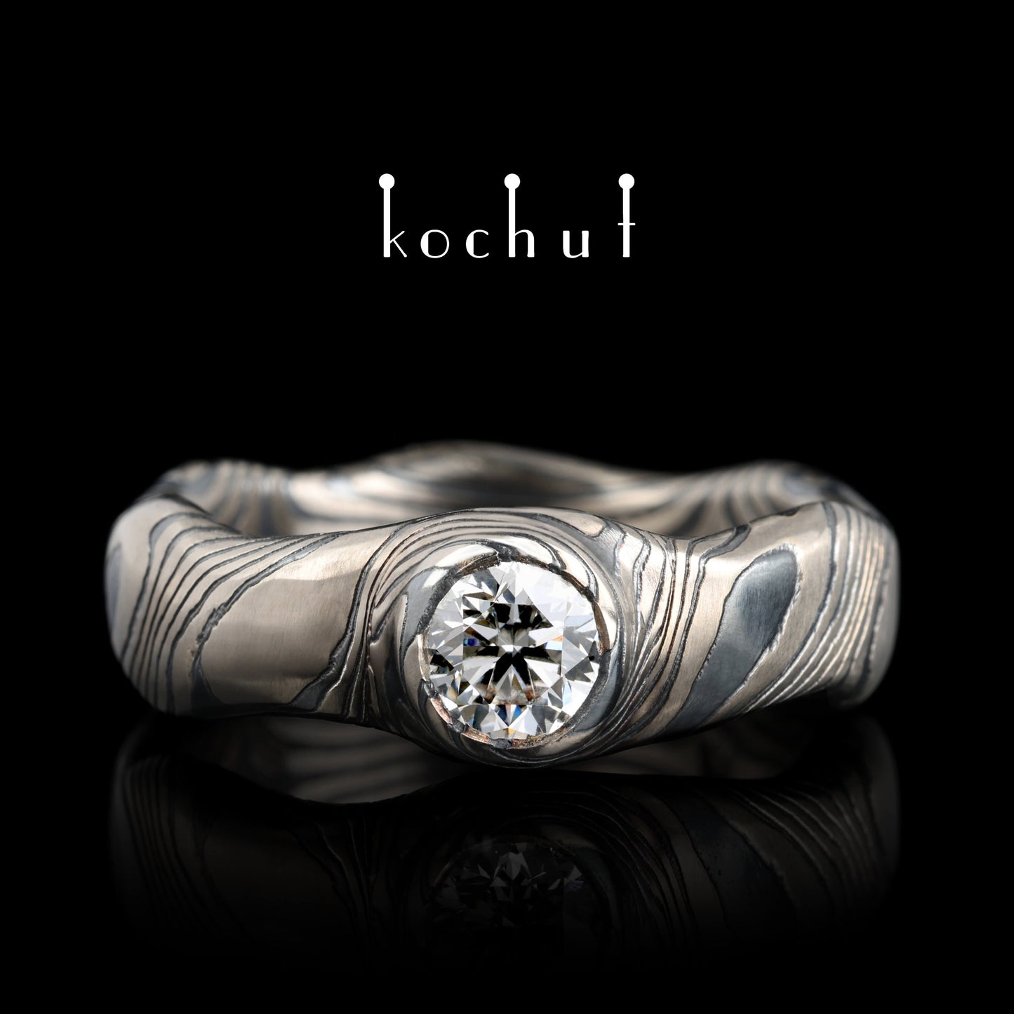 Polarlichter — Mokume-Ring aus Palladium-Gold und graviertem, oxidiertem Silber mit Diamant