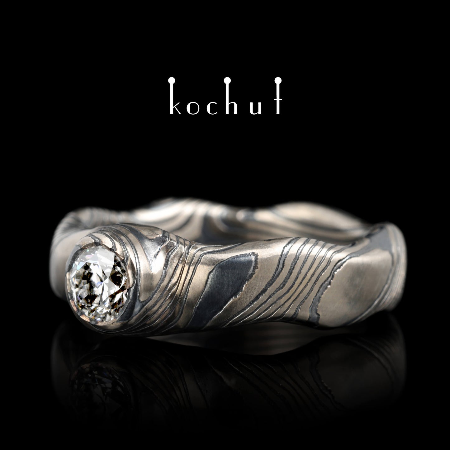 Polarlichter — Mokume-Ring aus Palladium-Gold und graviertem, oxidiertem Silber mit Diamant