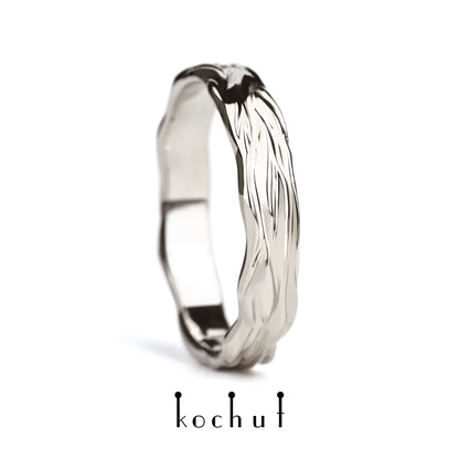 Wellen der Liebe — Ehering aus Palladium-Gold