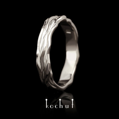 Wellen der Liebe — Ehering aus Palladium-Gold