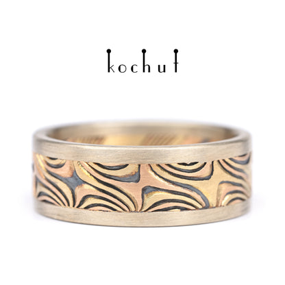Leuchten der östlichen Sterne — Mokume-Ring aus Gelb-, Rotgold und graviertem, oxidiertem Silber mit Rändern aus Weißgold