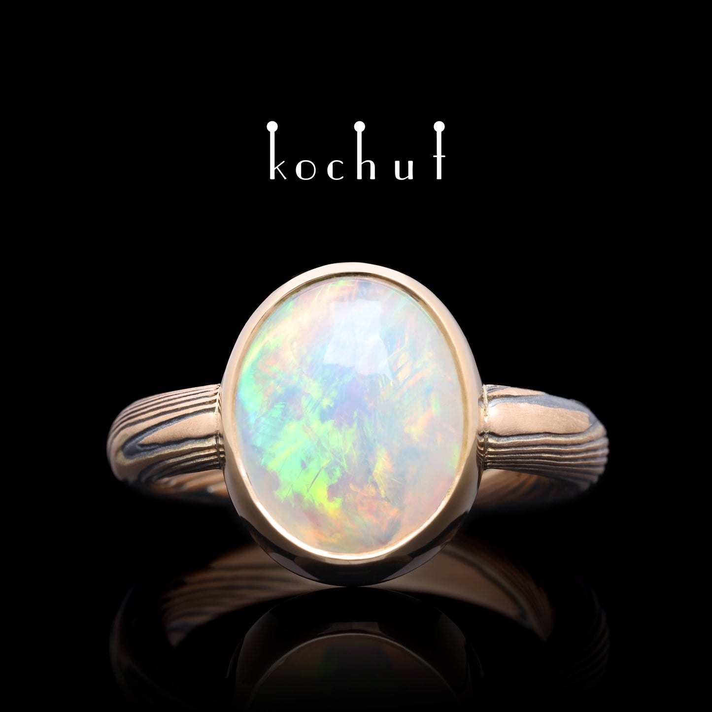 Haiku — Mokume-Ring aus Rotgold, graviertem und oxidiertem Silber mit Opal