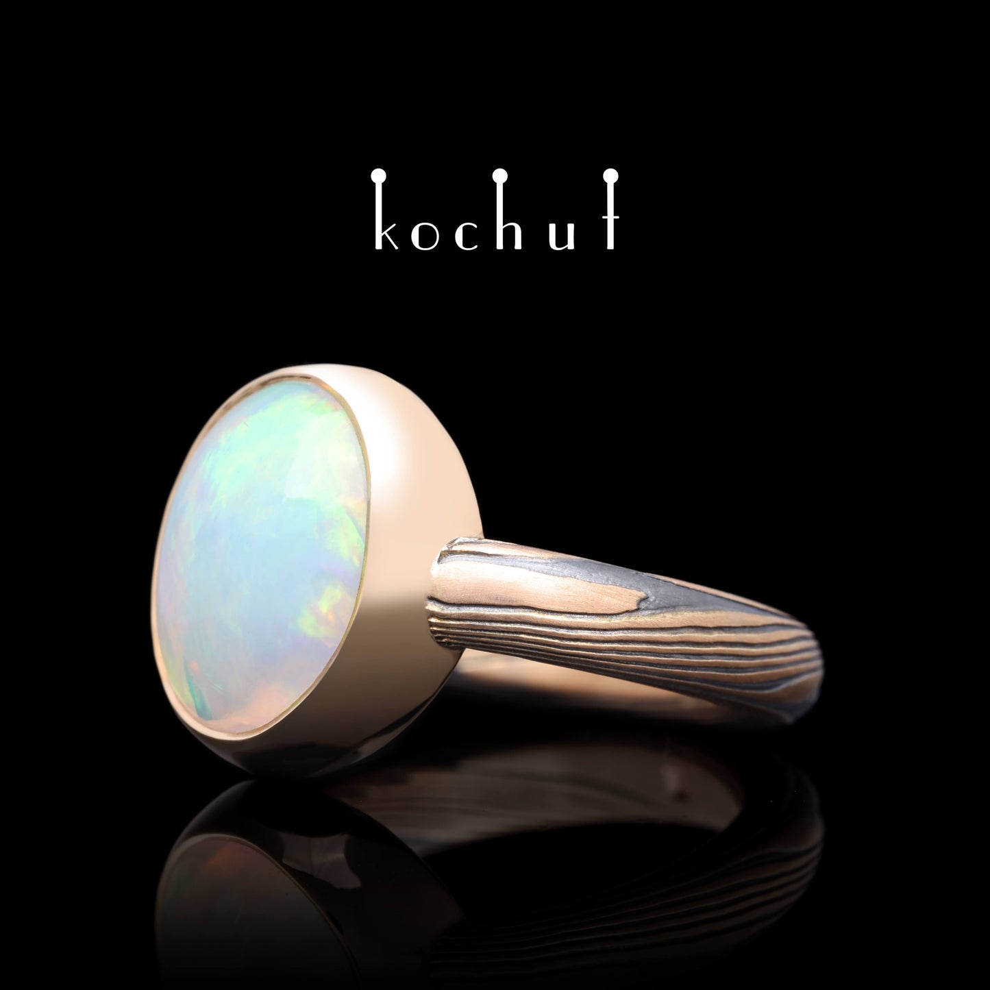 Haiku — Mokume-Ring aus Rotgold, graviertem und oxidiertem Silber mit Opal