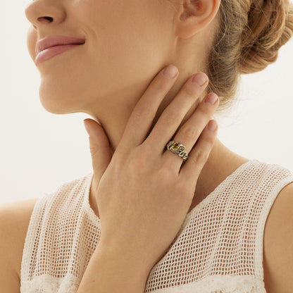 Versuchung — Ring aus Weiß- und Gelbgold mit gelbem Saphir, überzogen mit schwarzem Rhodium