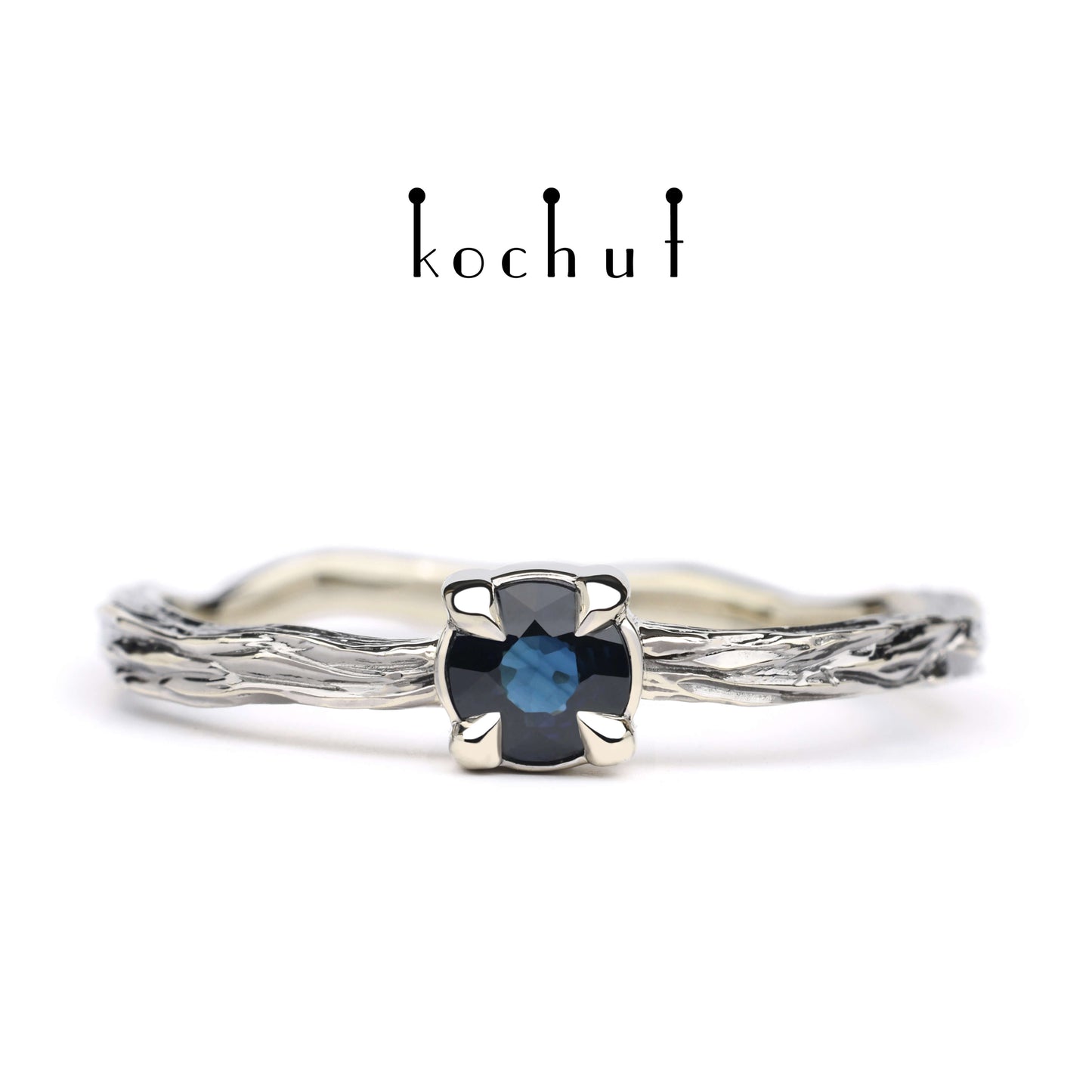 Winterzweig — Weißgoldring mit Saphir, beschichtet mit schwarzem Rhodium