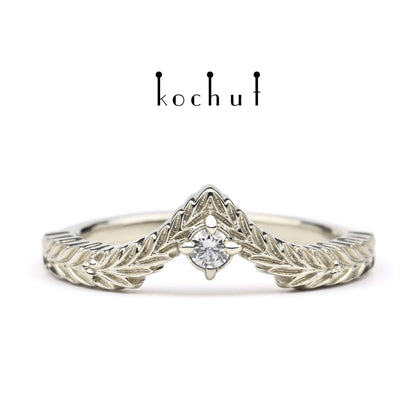 August-Schatz — Ring aus Weißgold mit Diamant