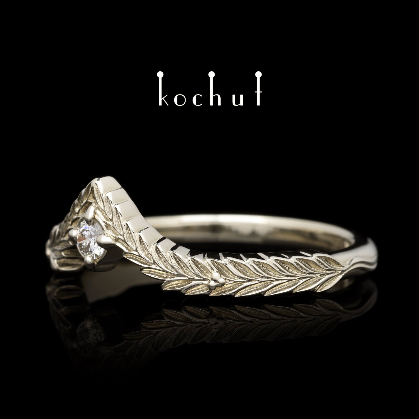 August-Schatz — Ring aus Weißgold mit Diamant