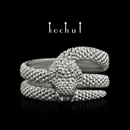 Liebe der Widerspenstigen — Ring aus Platin mit Diamanten