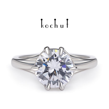 Melian — Verlobungsring aus Weißgold mit einem Diamanten, rhodiniert mit Weißrhythm.