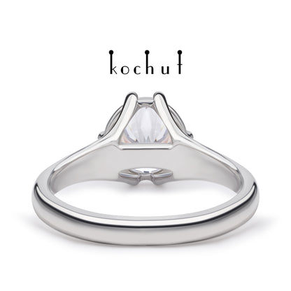 Melian — Verlobungsring aus Weißgold mit einem Diamanten, rhodiniert mit Weißrhythm.